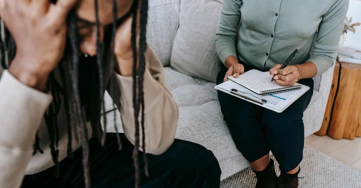 Mental health practitioners reviewing credentials and clinic information